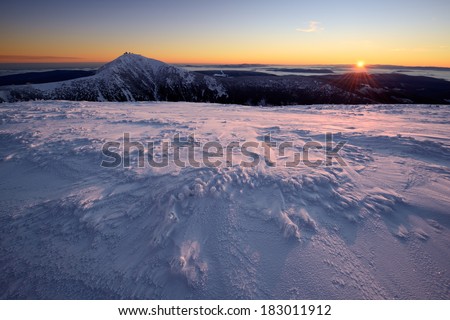 Snow Structure with the Rising Sun in the Background, Giant Mountains, Czech Republic