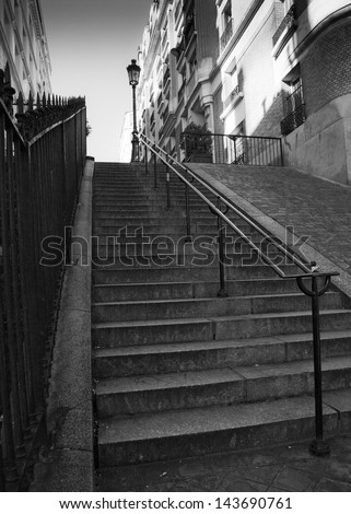 Streets of Paris in black and white. Stairs in Paris