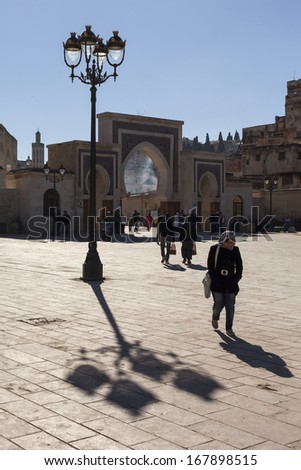 FES, MOROCCO, NOVEMBER 25: people walking thru Rcif Gate in Fes, Morocco, The Unesco World Heritage Site, 2013