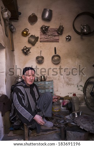 MARRAKECH, MOROCCO - MARCH 6: traditional store on streets on March 6, 2014. With a population of over 900,000 inhabitants it is the most important city in Morocco.