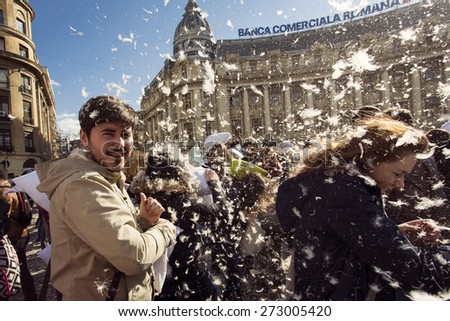 BUCHAREST, ROMANIA - APRIL 4: Crowds of unidentified people at International Pellow Fight on April 4, 2015 in Bucharest, Romania. Pillow fight it\'s an International event who happen around the world.