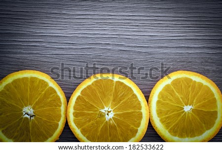 Oranges over Old Woody Background