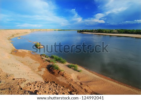 picturesque shore sloping sand bank of the river Yenisei
