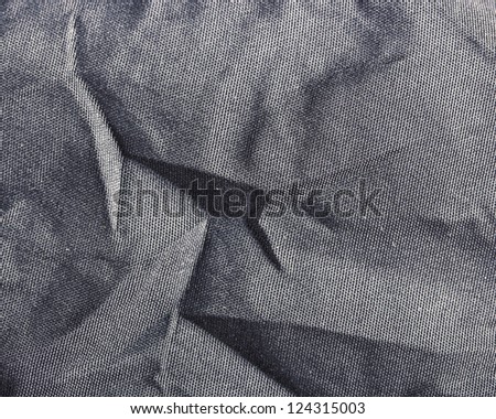 Texture of crumpled synthetic fabric