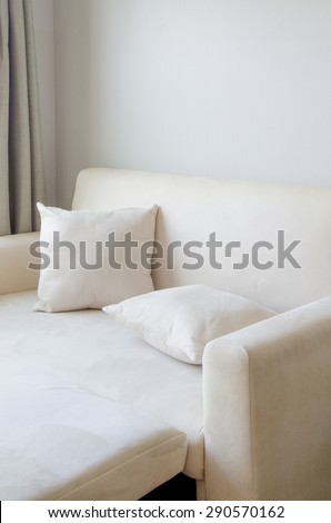 pillow placed on Sofa cream color in  The living room ,time for relax,break,relaxation