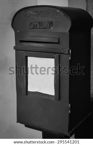 Old Steel Red Mail Box Hang on  Wall   Vintage style ,  Monochrome photo