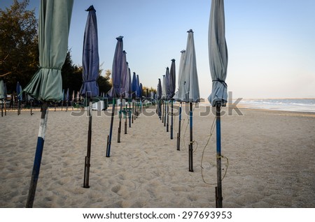 perspective  beach umbrella  on beach  vintage tone
