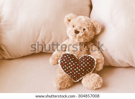 Dolly bears Lonely and The heart on sofa in living room in filter