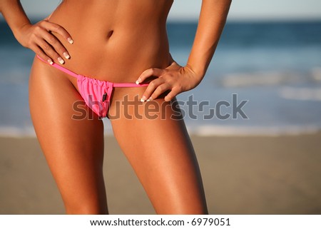 pink bikini brief on woman sexy woman at the beach