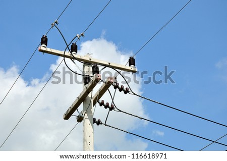 electricity posts  with blue sky background,high voltage electricity pole.
