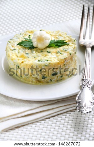 Salad with krill meat, canned pineapple, eggs, cheese, parsley and mayonnaise