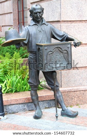 KIEV, UKRAINE - JULY 20: Father Carlo. Bronze statue of character from fairy tale \