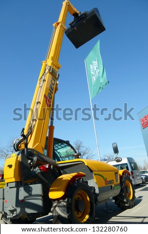 ROSTOV-ON-DON, RUSSIA - FEBRUARY 27: Universal telescopic loader - An exhibit at the exhibition of agricultural equipment Agrotechnologies-2013, February 27, 2013 in Rostov-on-Don, Russia