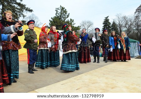 ROSTOV-ON-DON, RUSSIA - MARCH 17: Cossack dancing and singing. The Cossack Maslenitsa - traditional celebration and national ski races around, March 17, 2013 in Rostov-on-Don, Russia