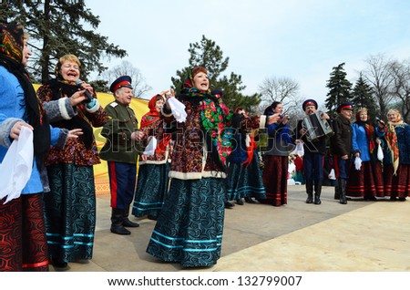 ROSTOV-ON-DON, RUSSIA -MARCH 17:Cossack dancing and singing. The Cossack Maslenitsa - traditional celebration and national ski races around, March 17, 2013 in Rostov-on-Don, Russia