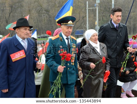 ROSTOV-ON-DON, RUSSIA - APRIL 11: The rally, placing flowers  International automobile race Ã?Â«Our Great VictoryÃ?Â» in honor of the Day of Victory in the WWII, April 11, 2013 in Rostov-on-Don, Russia