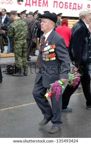 ROSTOV-ON-DON, RUSSIA - MAY 9: Veterans of the Great Patriotic War - Celebrating the 60th anniversary of Victory Day (WWII) at Theater Square, May 9, 2005 in Rostov-on-Don, Russia