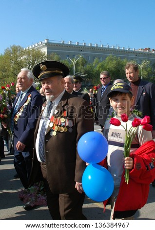 ROSTOV-ON-DON, RUSSIA - MAY 9: Veterans of the Great Patriotic War during the celebration of the 61th anniversary of Victory Day (WWII) at Theater Square, May 9, 2006 in Rostov-on-Don, Russia
