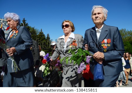 ROSTOV-ON-DON, RUSSIA - MAY 7: The rally, placing flowers International automobile race \