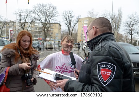 ROSTOV-ON-DON, RUSSIA - FEBRUARY 13: Flash-mob - 100m in uggah in support of the Olympic Games 2014. Interview with the winner of the race. Rostov-on-Don, February 13, 2014 in Rostov-on-Don, Russia
