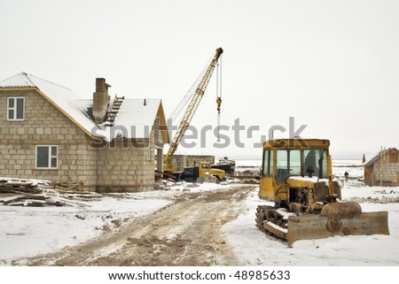 winter building of houses from blocks