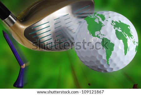 golf world.  Action of golf club or driver hitting golf ball with world map on it with flying golf tee and dirt over blurred green background