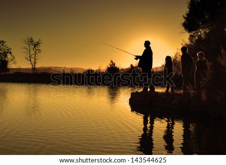 family fishing silhouette