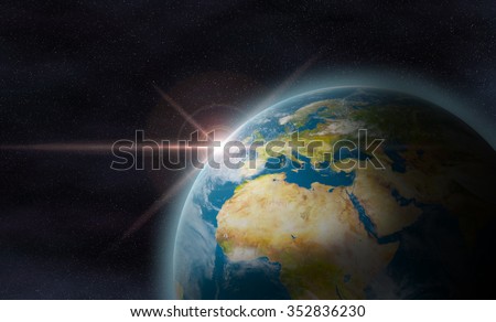 Planet earth with sunrise in space.The Earth texture of this image furnished by NASA.