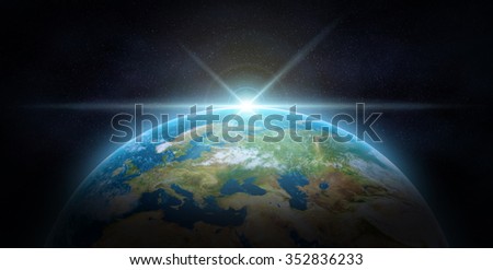 Blue sunrise, view of earth from space.The Earth texture of this image furnished by NASA.