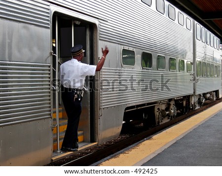 stock-photo-commuter-train-conductor-492425.jpg
