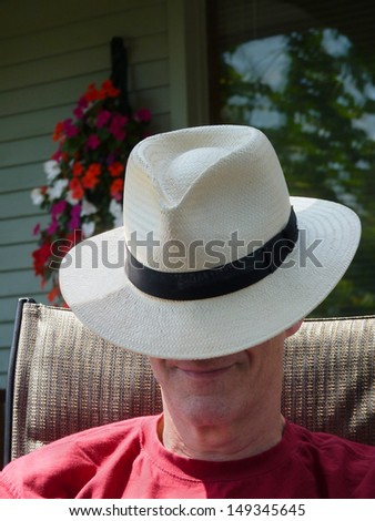 Man with Panama hat.