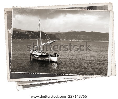Vintage photos Old wooden sail ship, docked in the port of Portofino, Italy