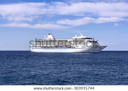 The white passenger ship sailing on the Mediterranean Sea