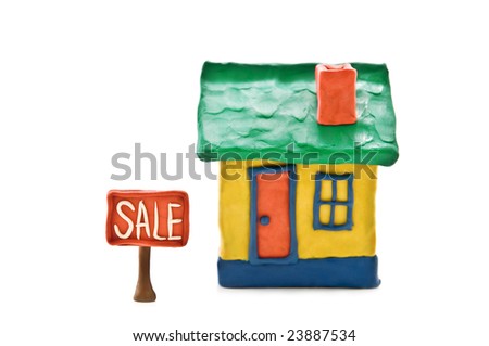 small plasticine house isolated on white