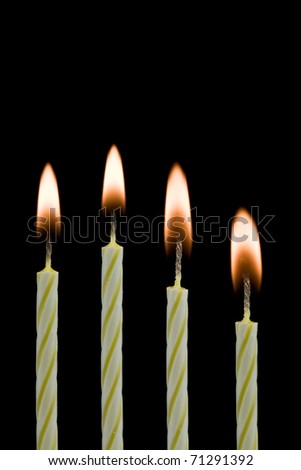 candles isolated on black background