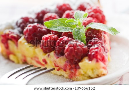 raspberry cake isolated on white