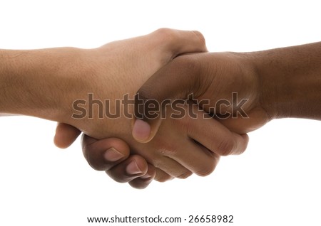 stock photo : Black and white hands shaking in friendly agreement isolated 