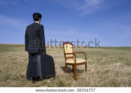 Business man with a suitcase ready to go away