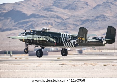 NELLIS AFB, LAS VEGAS, NV - NOVEMBER 14: B-25 Mitchell vintage WWII-era bomber aircraft takes off at Aviation Nation 2009 on November 14, 2009 in Nellis AFB, Las Vegas, NV