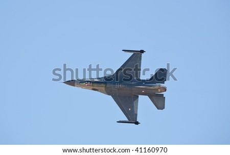 NELLIS AFB, LAS VEGAS, NV - NOVEMBER 14: The Royal Netherlands Airforce's F-16 performs aileron roll maneuver at Aviation Nation 2009, November 14, 2009, Nellis AFB, Las Vegas, NV