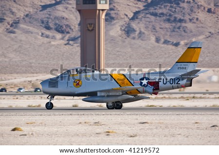 NELLIS AFB, LAS VEGAS, NV - NOVEMBER 14: North American F-86F Sabre Cold war-era fighter jet aircraft landing after performing at Aviation Nation 2009, November 14, 2009, Nellis AFB, Las Vegas, NV