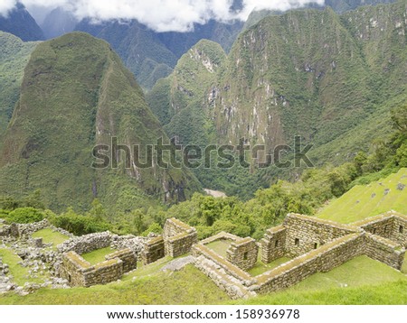 View from The Sun Temple in a pre-Columbian 15th-century Inca site of Machu Picchu in Machupicchu District, Urubamba Province, Cusco Region, Peru.