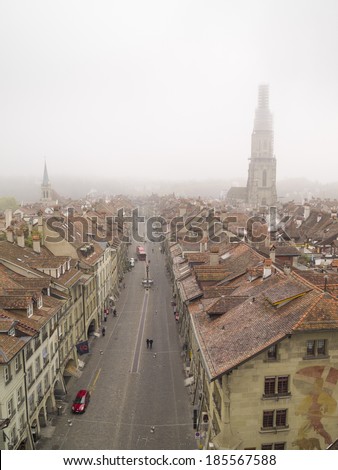 BERN, SWITZERLAND - OCT 23: Aerial view of Bern in morning mist on October 23, 2011 in Bern, Switzerland. In 1983 the historic old town in the centre of Bern became a UNESCO World Heritage Site.
