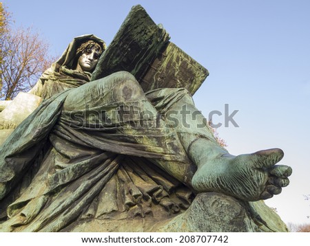 BERLIN, GERMANY -NOV 12: Statue of sibyl reclining on a sphinx and reading the book of history on November 12, 2011 in Berlin, Germany. This statue located in the Bismarck Memorial in Tiergarten.