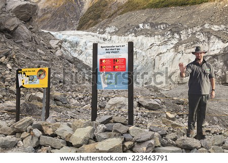 WEST COAST, NEW ZEALAND -MAY 20: Warning signs at Fox Glacier terminal face on May 20, 2013 in West Coast, NZ. Many tourists have died or been seriously injured after ignoring these signs.
