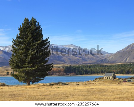 Beautiful landscape of Lake Tekapo with the Church of the Good Shepherd in far distance, South Island, New Zealand.