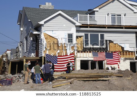 FAR ROCKAWAY, NY - NOVEMBER 11:Volunteers help to rebuild New York in the aftermath of Hurricane Sandy on November 11, 2012 in Far Rockaway, NY