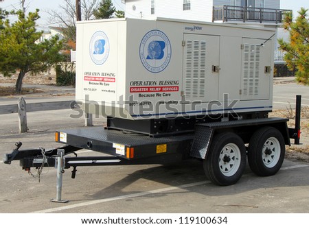 BREEZY POINT, NY - NOVEMBER 15: Disaster relief services electrical generator located at devastated area  in the aftermath of Hurricane Sandy on November 15, 2012 in Breezy Point, NY