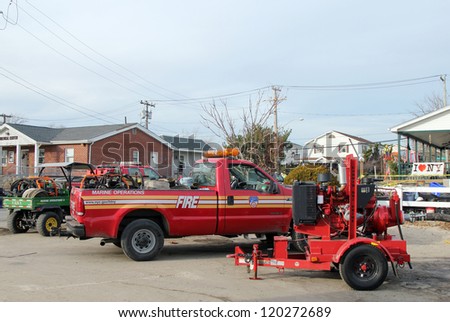 BREEZY POINT, NY - NOVEMBER 20: Fire department marine operations truck with water pump  moved to flooded area in the aftermath of Hurricane Sandy on November 20, 2012 in Breezy Point, NY