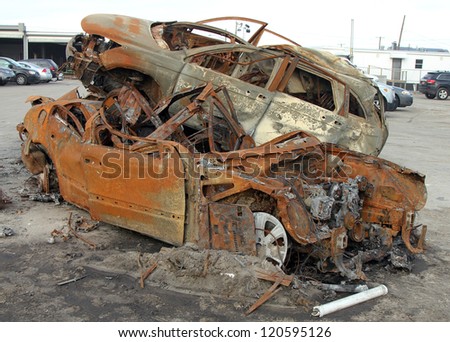 BREEZY POINT, NY - NOVEMBER 20: Burned cars in the aftermath of Hurricane Sandy on November 20, 2012 in Breezy Point, NY.